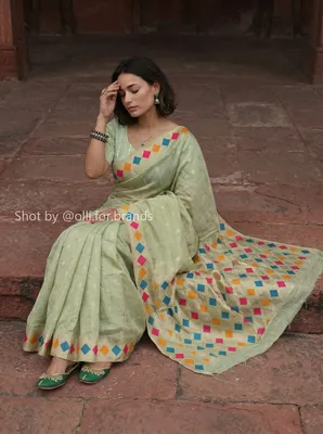 Pastel Green Embroidered Saree women's wear lookbook image.