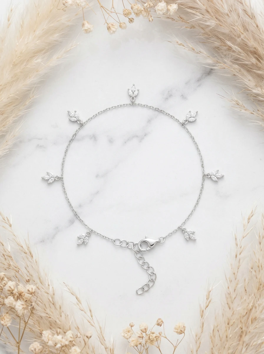 AI flat-lay photoshoot of a silver charm bracelet, for a bracelet brand selling on marketplaces