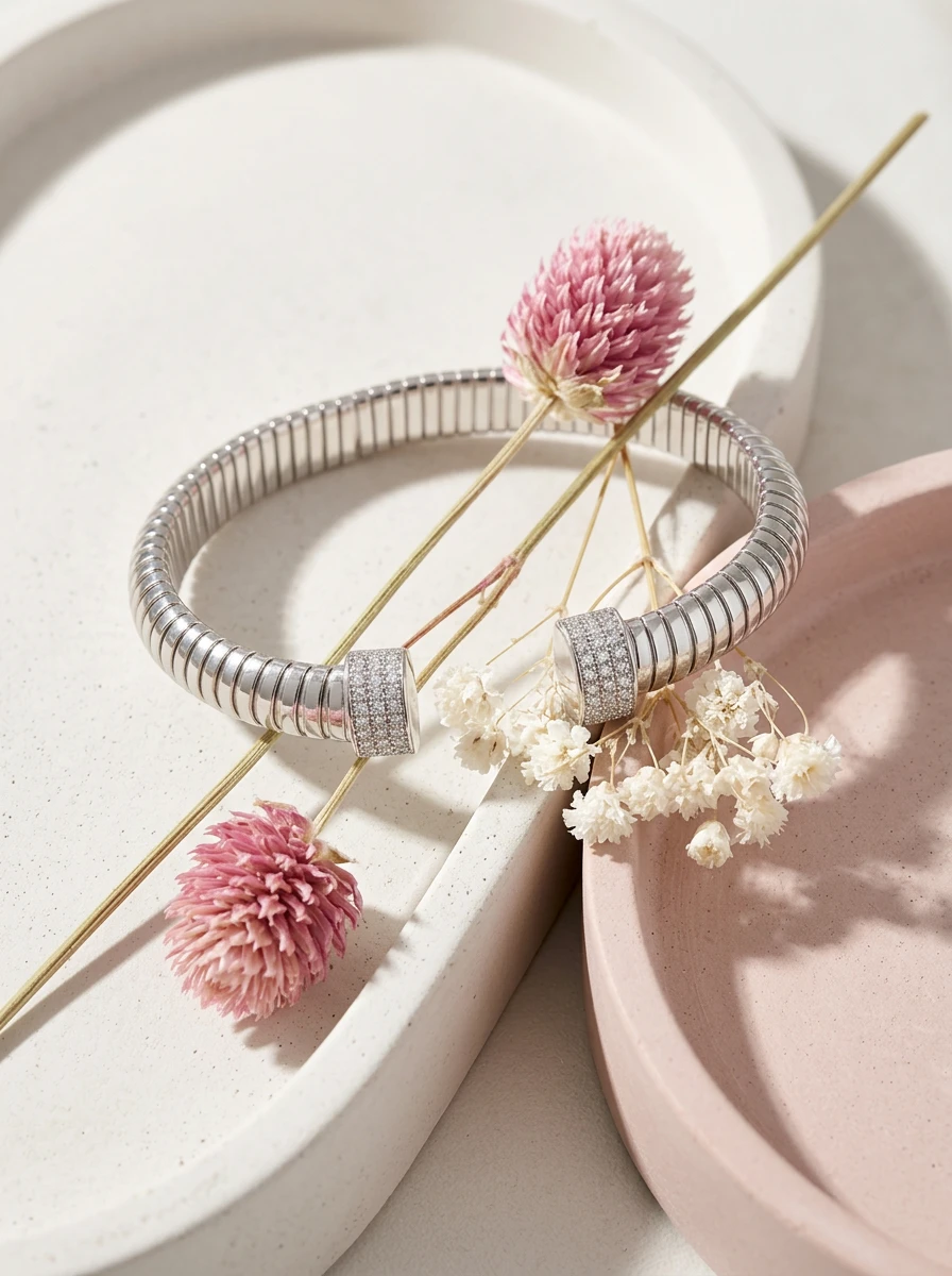 Studio AI flat-lay photoshoot of a silver bracelet with dried flowers, for a bracelet brand selling on marketplaces