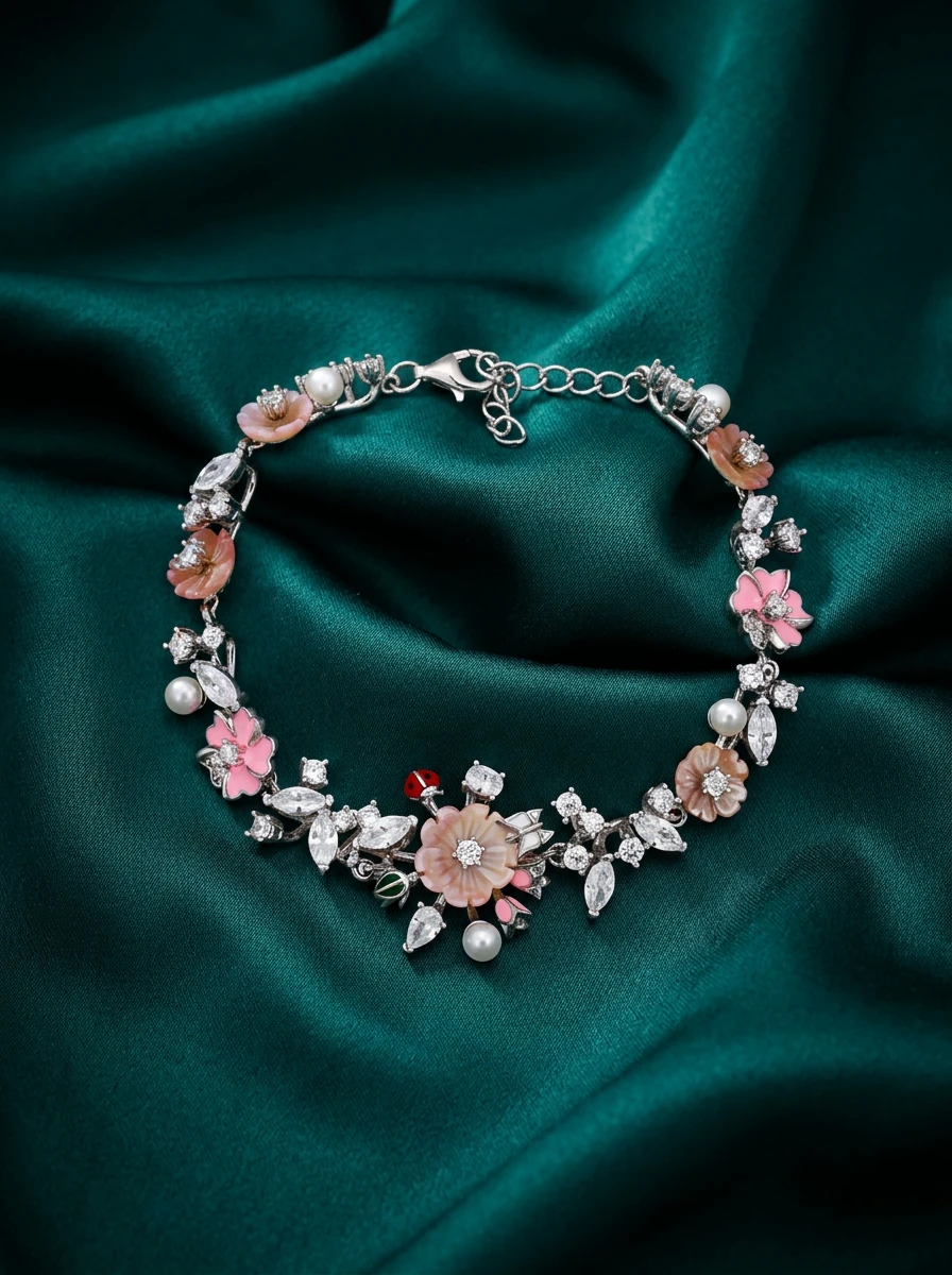 Studio AI photoshoot of a floral charm bracelet on green silk, for a bracelet brand selling on marketplaces