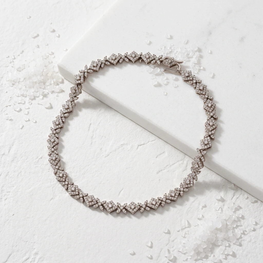 AI flat-lay photoshoot of a paved diamond anklet on a white stone surface, for an anklets brand selling on marketplaces