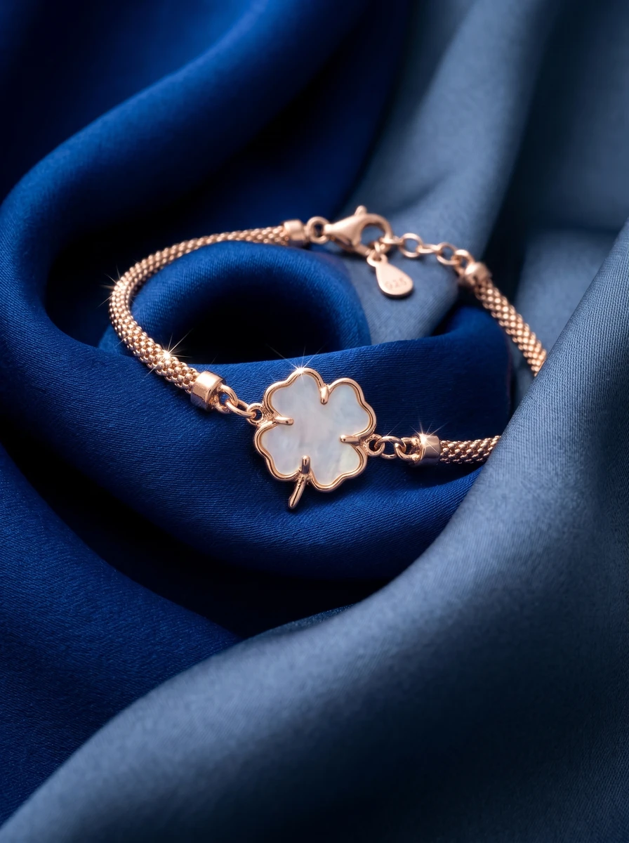 Studio AI photoshoot of a clover charm bracelet on draped fabric, for a bracelet brand selling on marketplaces