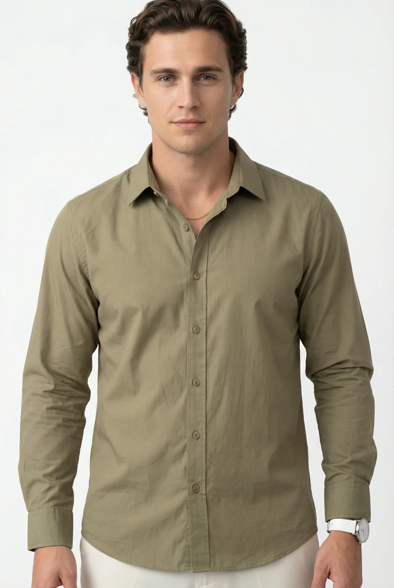 Male model wearing a long-sleeved olive green button-down shirt against a white studio backdrop