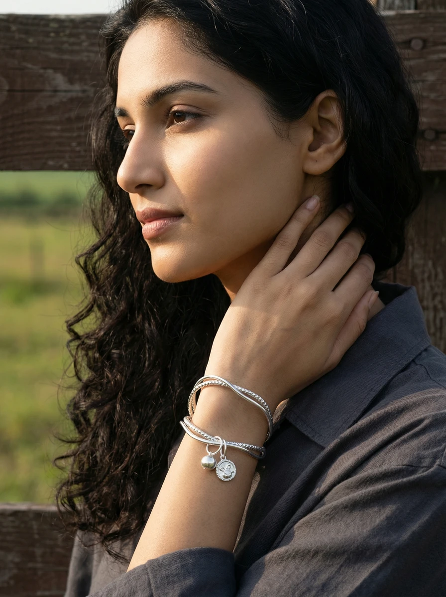 Outdoor lifestyle AI photoshoot of a silver bracelet on a model, for a bracelet brand selling on marketplaces